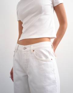 Model wearing Ember low rise relaxed straight jean in white - WHITE