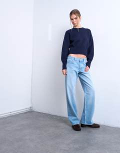 Model wearing Ember low rise straight jean in bleach