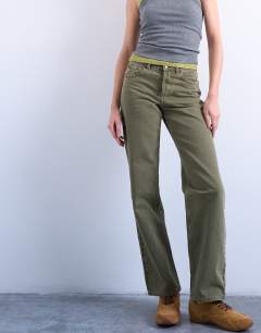 Model wearing Ember low rise straight jean in khaki