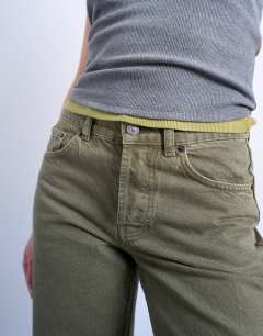 Model wearing Ember low rise straight jean in khaki