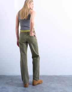 Model wearing Ember low rise straight jean in khaki