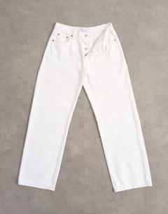 Model wearing Ember low rise straight jean in white