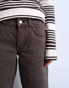 Model wearing Ember low rise straight leg jean in chocolate