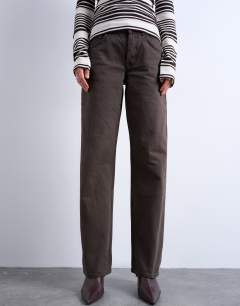 Model wearing Ember low rise straight leg jean in chocolate