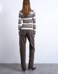 Model wearing Ember low rise straight leg jean in chocolate