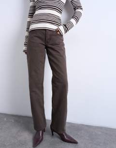 Model wearing Ember low rise straight leg jean in chocolate