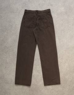 Model wearing Ember low rise straight leg jean in chocolate