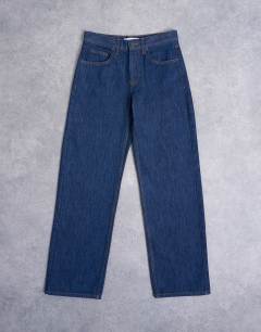 Model wearing Ember low rise straight leg jean in indigo rinse