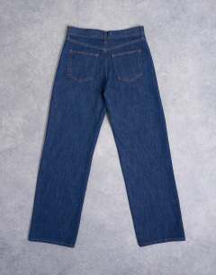 Model wearing Ember low rise straight leg jean in indigo rinse
