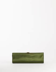 Model wearing Ember small envelope satin clutch bag in green