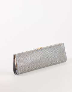 Model wearing Ember small envelope satin clutch bag in silver diamante