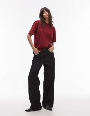 Topshop - Ember - Weite Jeans in Schwarz und Ecru mit niedrigem Bund