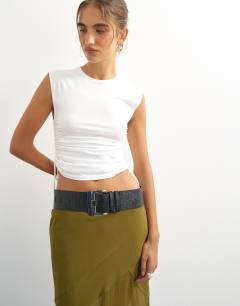 Model wearing Embossed real leather chunky leather belt in black