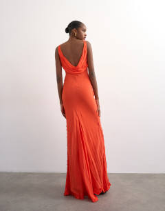 Model wearing Embroidered maxi occasion dress in orange
