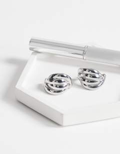 Model wearing Emry waterproof stainless steel stud earring in silver