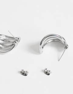 Model wearing Emry waterproof stainless steel stud earring in silver