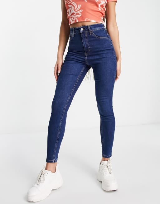 Topshop enhancing Jamie jeans in mid blue