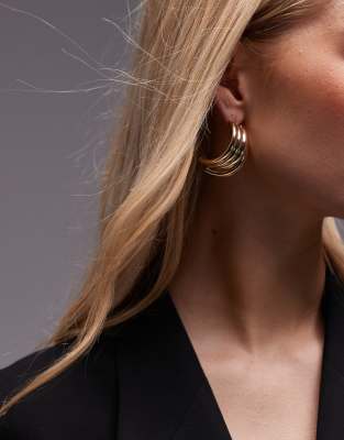 Eric statement ribbed stud earrings in gold tone