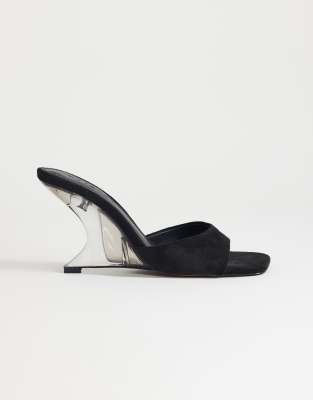 Esme - Mules in Schwarz mit transparentem, hohem Keilabsatz Schwarz 39