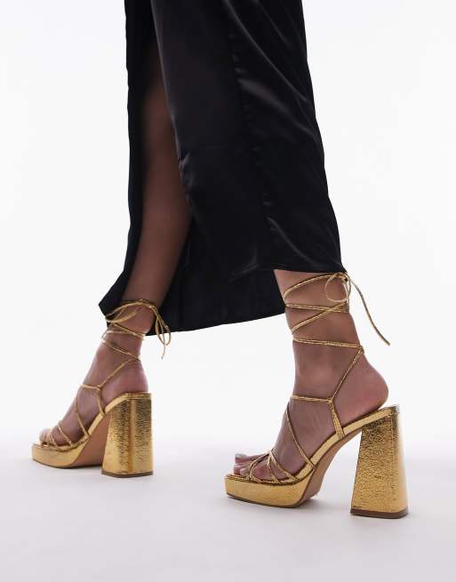 Topshop Eve heeled platform with ankle tie in gold | ASOS