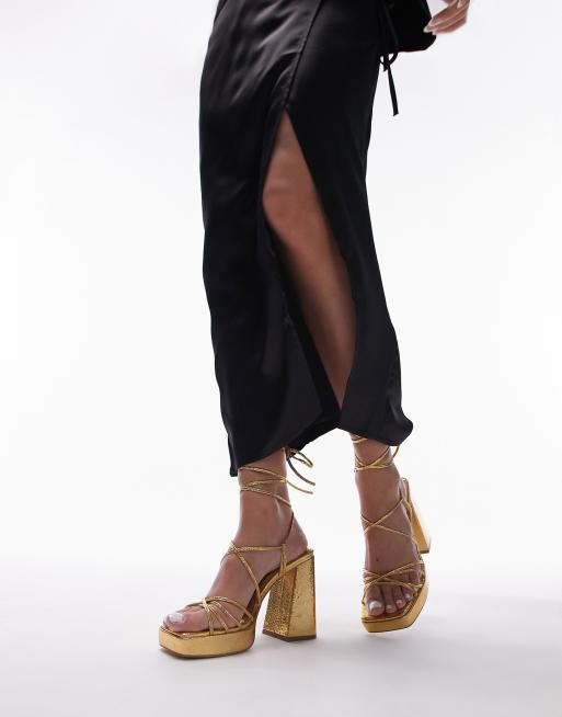 Topshop Eve heeled platform with ankle tie in gold | ASOS