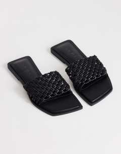 Eve woven flat sandal in black