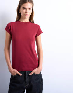 Model wearing Everyday tee in dark red