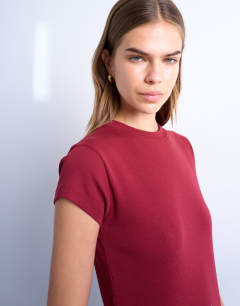 Model wearing Everyday tee in dark red