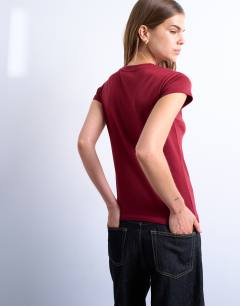 Model wearing Everyday tee in dark red