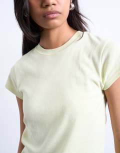 Model wearing Everyday tee in light green