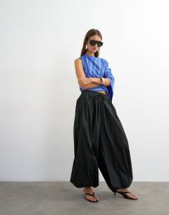 Model wearing Extreme balloon trouser in black