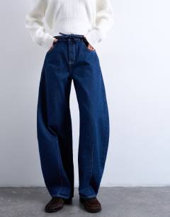 Extreme barrel mid rise jean with belt detail in indigo rinse