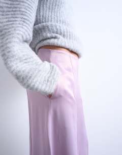 Model wearing Extreme wide leg satin trouser in pink