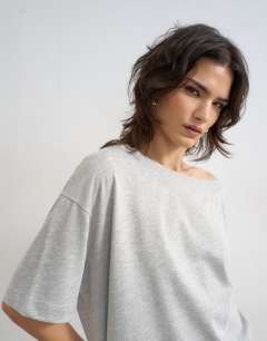Model wearing Fallen shoulder t-shirt in grey marl