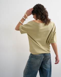 Model wearing Fallen shoulder t-shirt in khaki