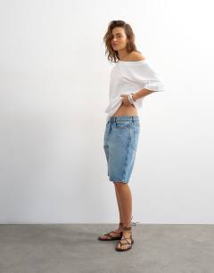 Model wearing Fallen shoulder t-shirt in white