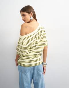 Model wearing Fallen shoulder t-shirt in yellow stripe