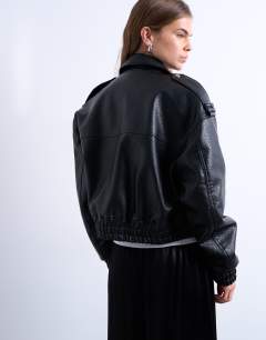 Model wearing Faux bubble leather 80s bomber jacket in black