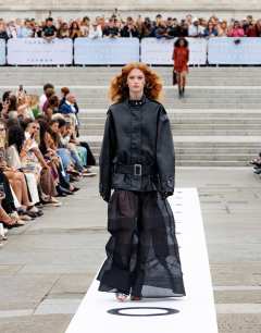 Faux bubble leather short belted funnel bomber jacket in black