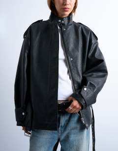 Model wearing Faux bubble leather short belted funnel bomber jacket in black