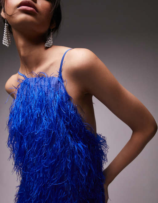 Blue dress hotsell with feathers