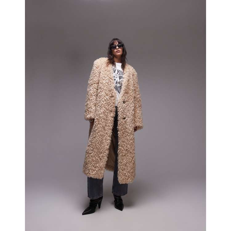 Topshop faux fur collarless long coat in honey | ASOS