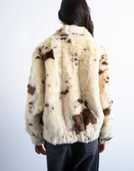 Topshop faux fur cow print funnel neck bomber jacket in cream | ASOS