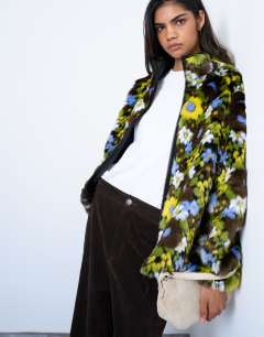 Model wearing Faux fur floral bomber jacket in multi