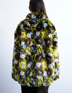 Model wearing Faux fur floral bomber jacket in multi