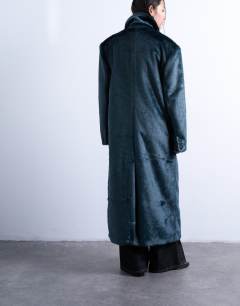 Model wearing Faux fur longline double breasted coat in teal