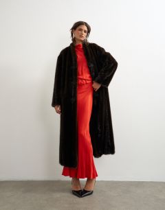 Model wearing Faux fur longline jacket with knot fastening in dark brown