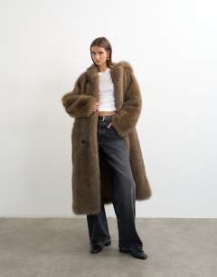 Model wearing Faux fur longline toggle coat in brown