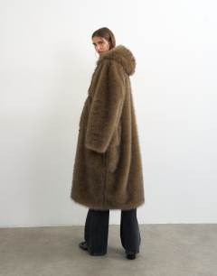 Model wearing Faux fur longline toggle coat in brown