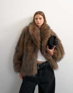 Model wearing Faux fur mid length shawl jacket in light brown
